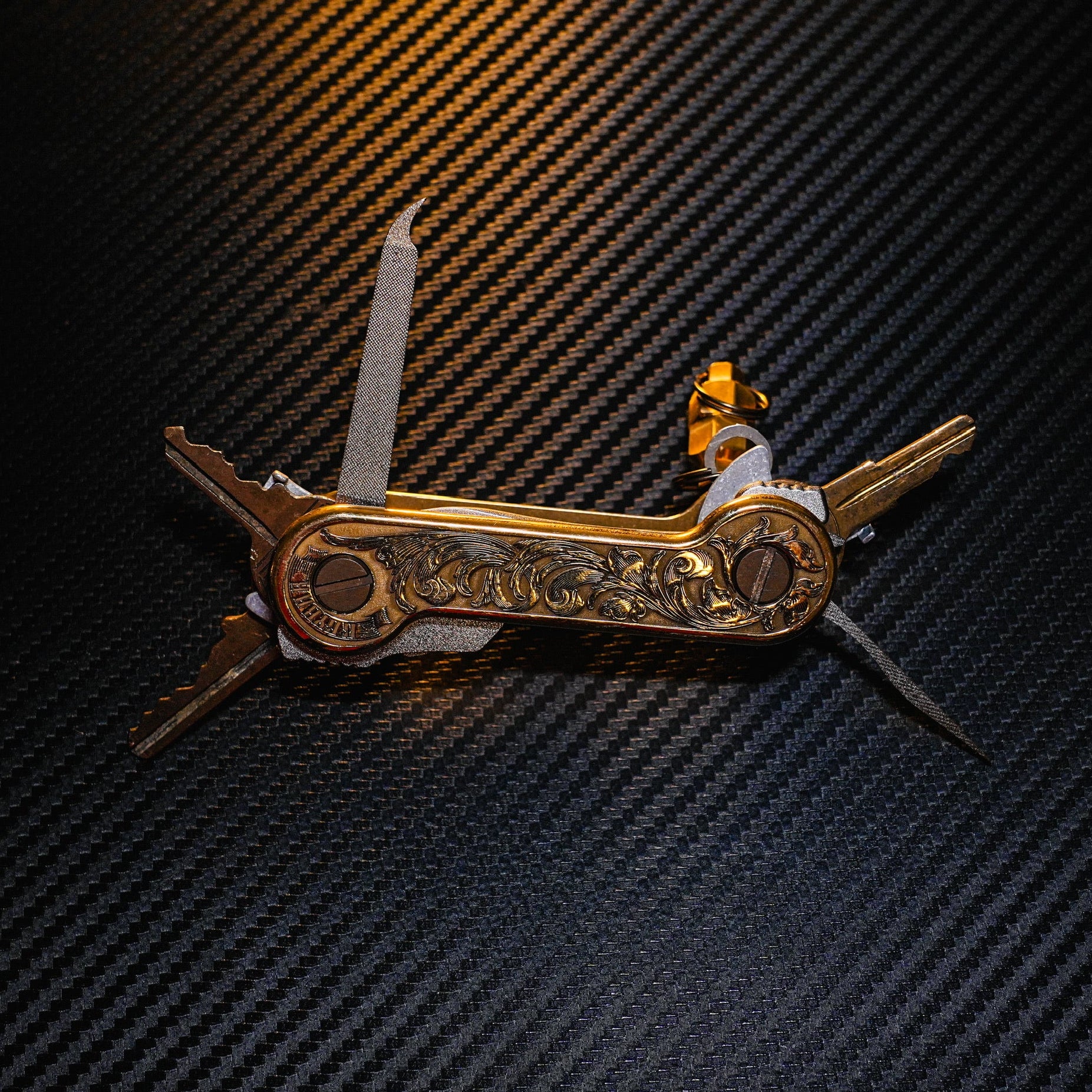 Brass Engraverhand Key and Tool Holder front open with titanium nail fle and pick, and brass magnuts.