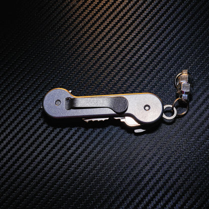 Aluminum KeyBar Key and Tool Holder closed back with standard titanium pocket clip and aluminum MagNuts.