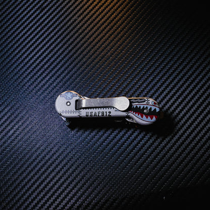 Aluminum UV Bomber KeyBar Key and Tool Holder closed back with standard titanium pocket clip.
