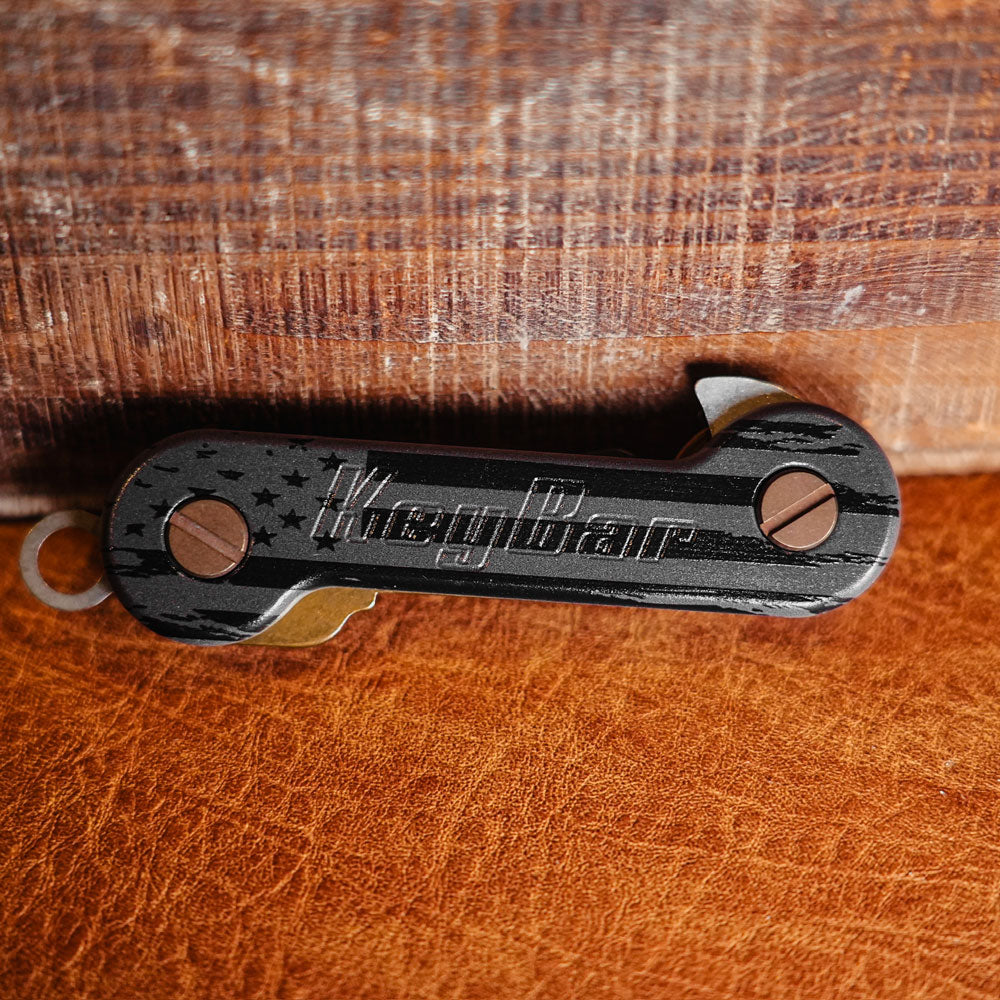 Black-and-Gray-Flag-Aluminum-UV-Printed-KeyBar-Key-and-Tool-Holder-closed-front