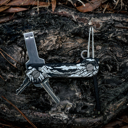 Black_Anodized_Aluminum_Sierra_Aluminum_KeyBar_Key_and_Tool_Organizer_open_front_with_flash_drive_titanium_tweezers_and_pen_insert