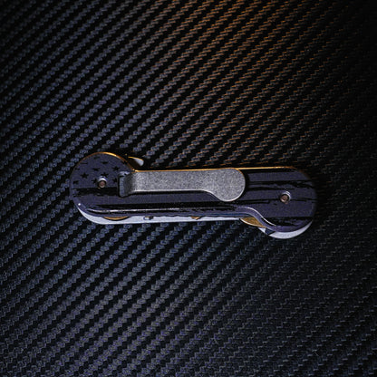 Black and Gray UV Printed Aluminum KeyBar Key and Tool Holder closed back with standard titanium pocket clip.
