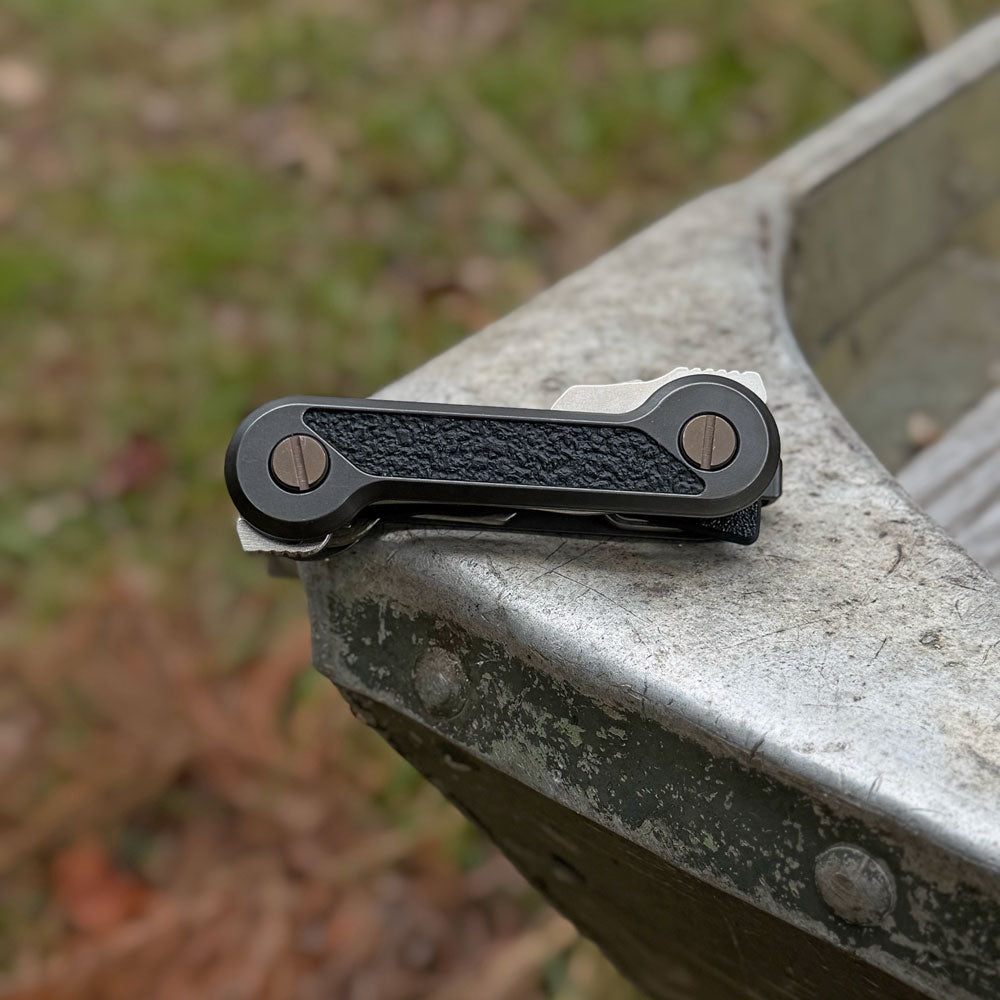 Blackwashed Titanium KeyBar with Cordura Skin | Black Rubber Grip