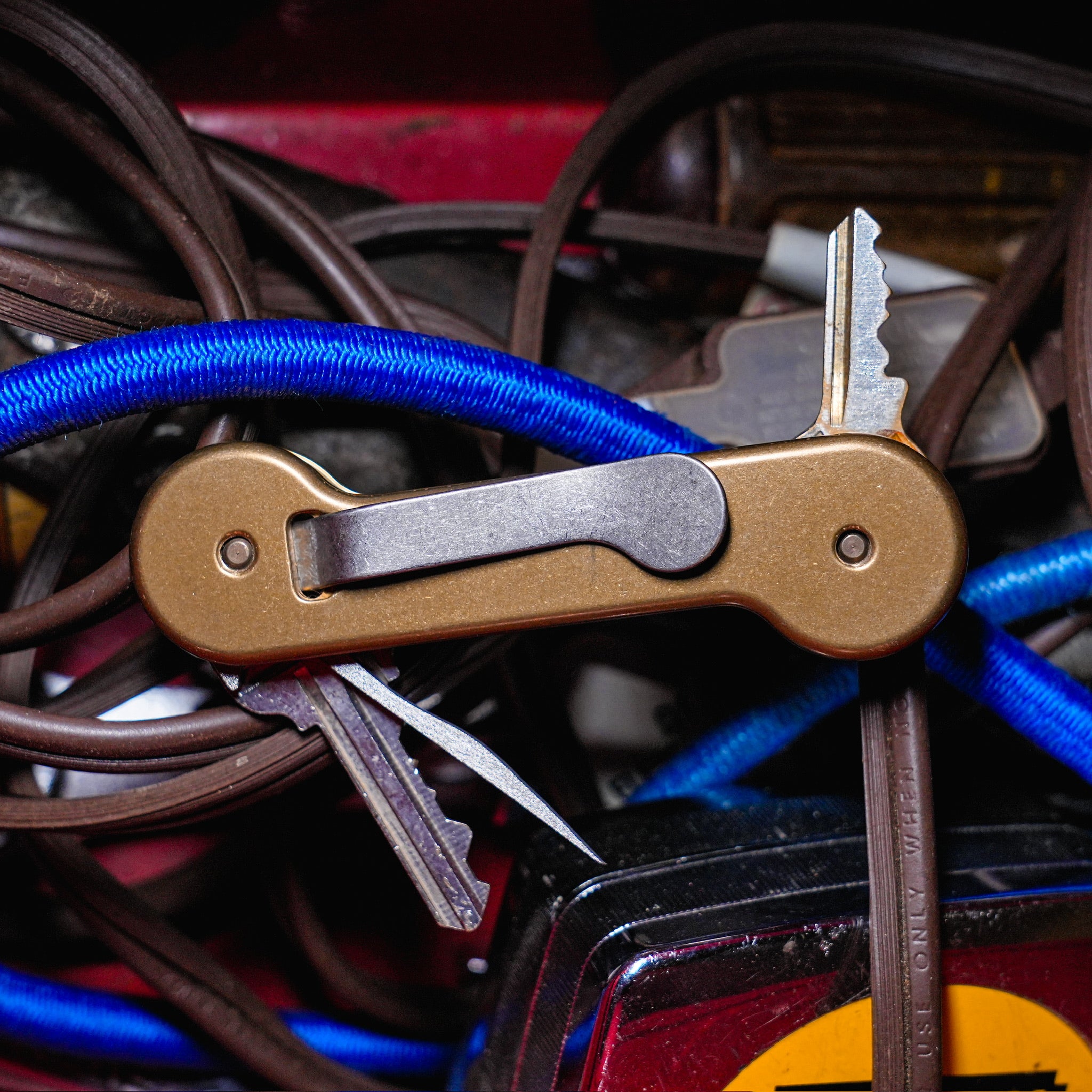 Brass KeyBar Key and Tool Holder open back with keys and titanium pick
