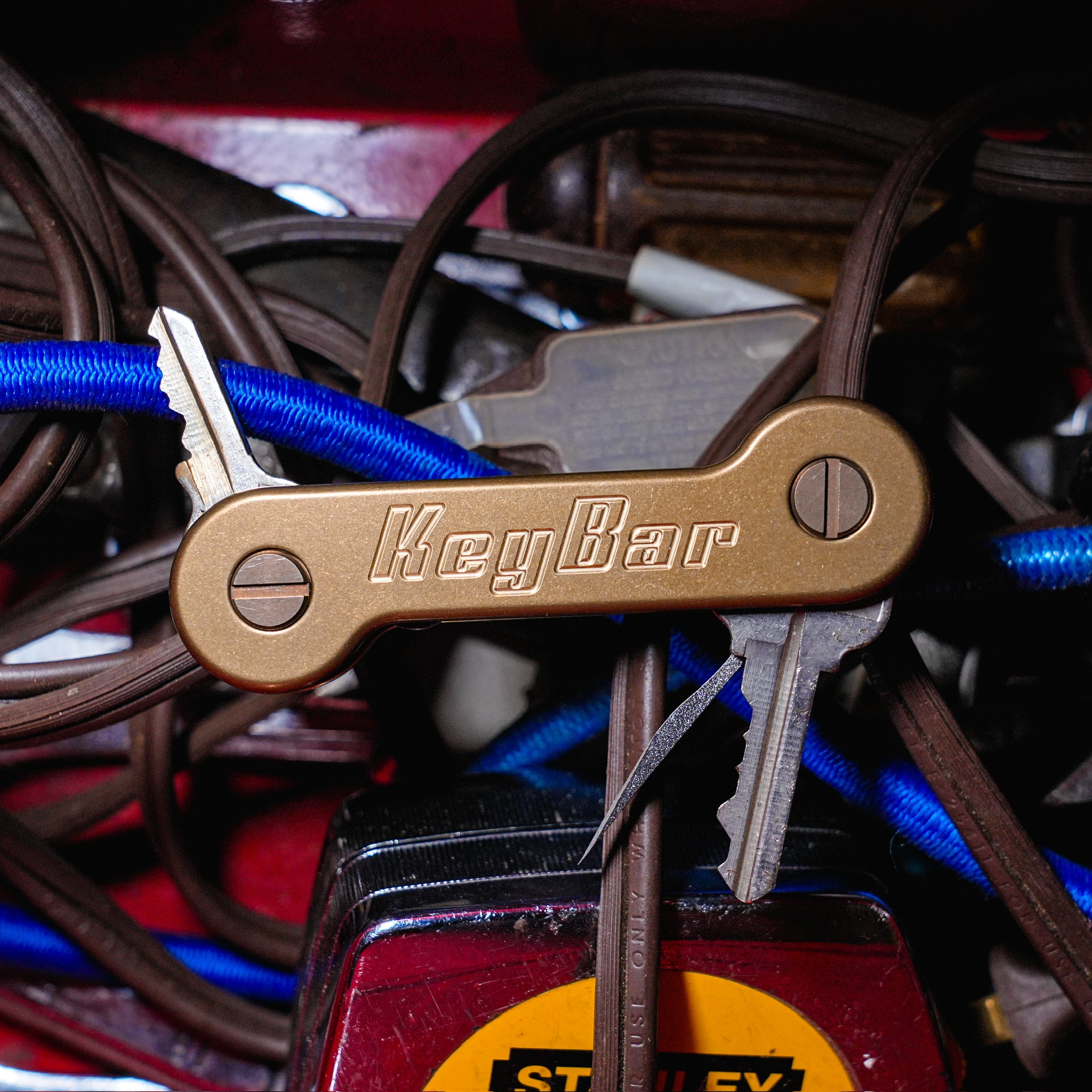 Brass KeyBar Key and Tool Holder open front with keys and titanium pick