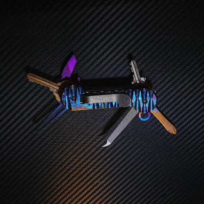 Crystallized Slayer Titanium KeyBar Key and Tool Holder with titanium bottle opener, nail file and tweezers.