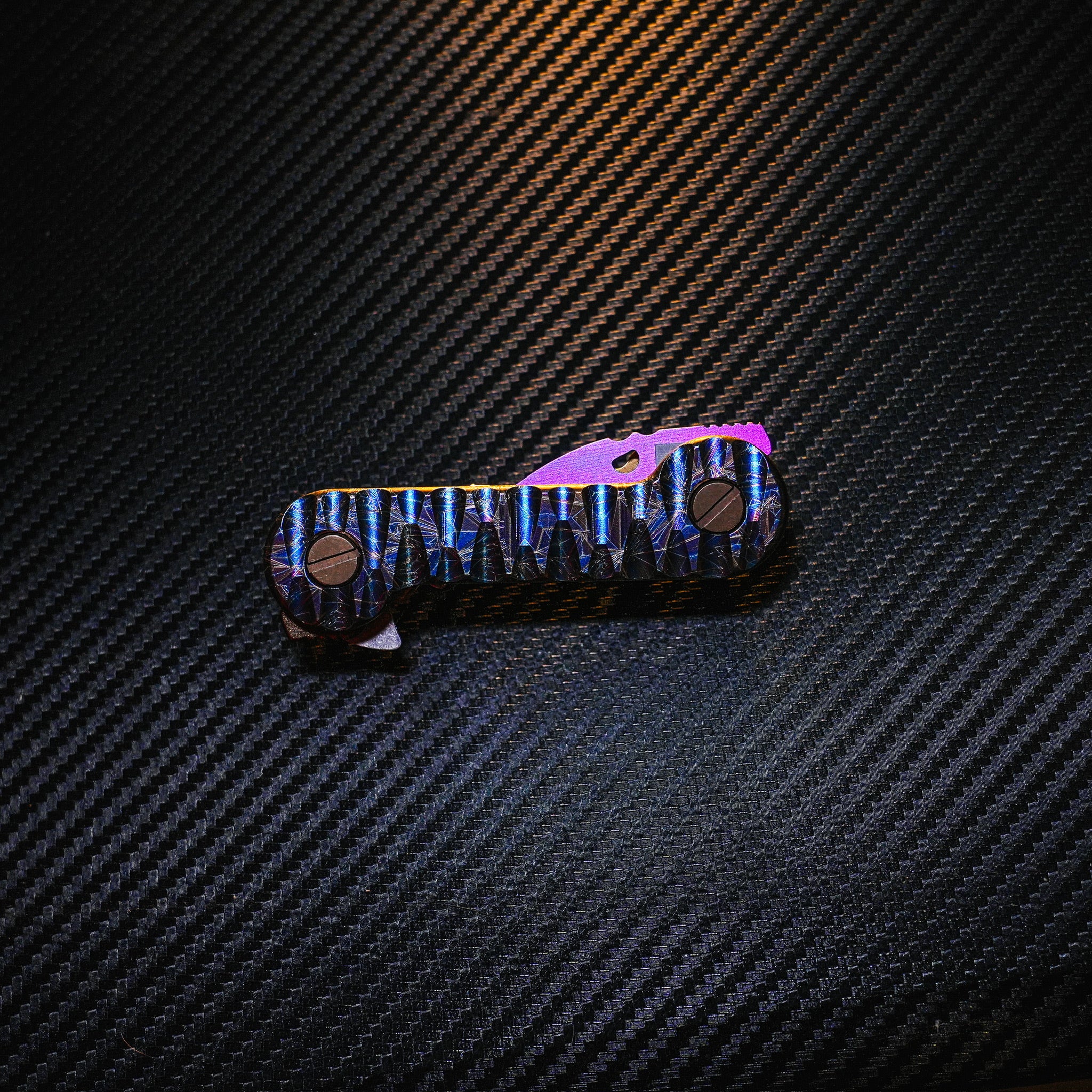 Crystallized Slayer Titanium KeyBar Key and Tool Organizer with titanium nail file, titanium phillips head screwdriver, titanium bottle opener, titanium tweezers and aluminum quick key tab - closed.