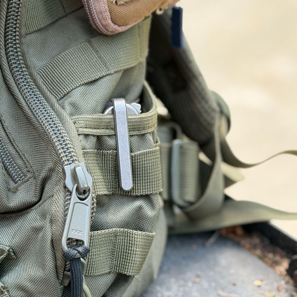 Deep-carry-titanium-pocket-clip-on-KeyBar-key-and-tool-holder-on-backpack