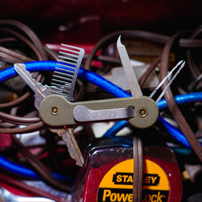 Green Micarta KeyBar Key and Tool Holder with tiitanium pick, nail file, and comb back open