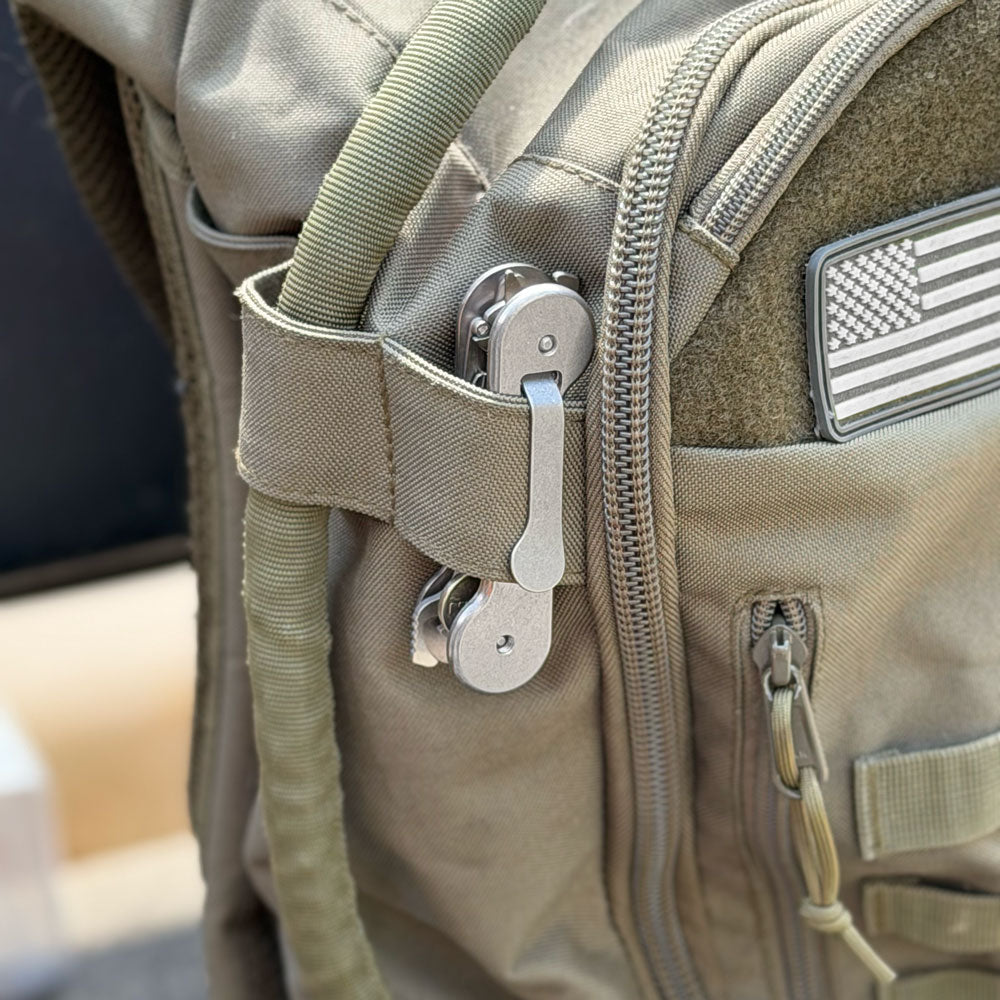 Standard-titanium-pocket-clip-on-KeyBar-key-and-tool-holder-on-backpack