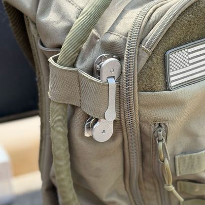 Standard-titanium-pocket-clip-on-KeyBar-key-and-tool-holder-on-backpack