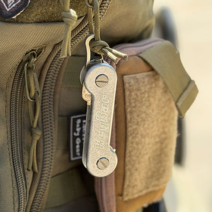Titanium-Keyrabiner-4.0-on-KeyBar-Key-and-Tool-Holder-hanging-on-backpack
