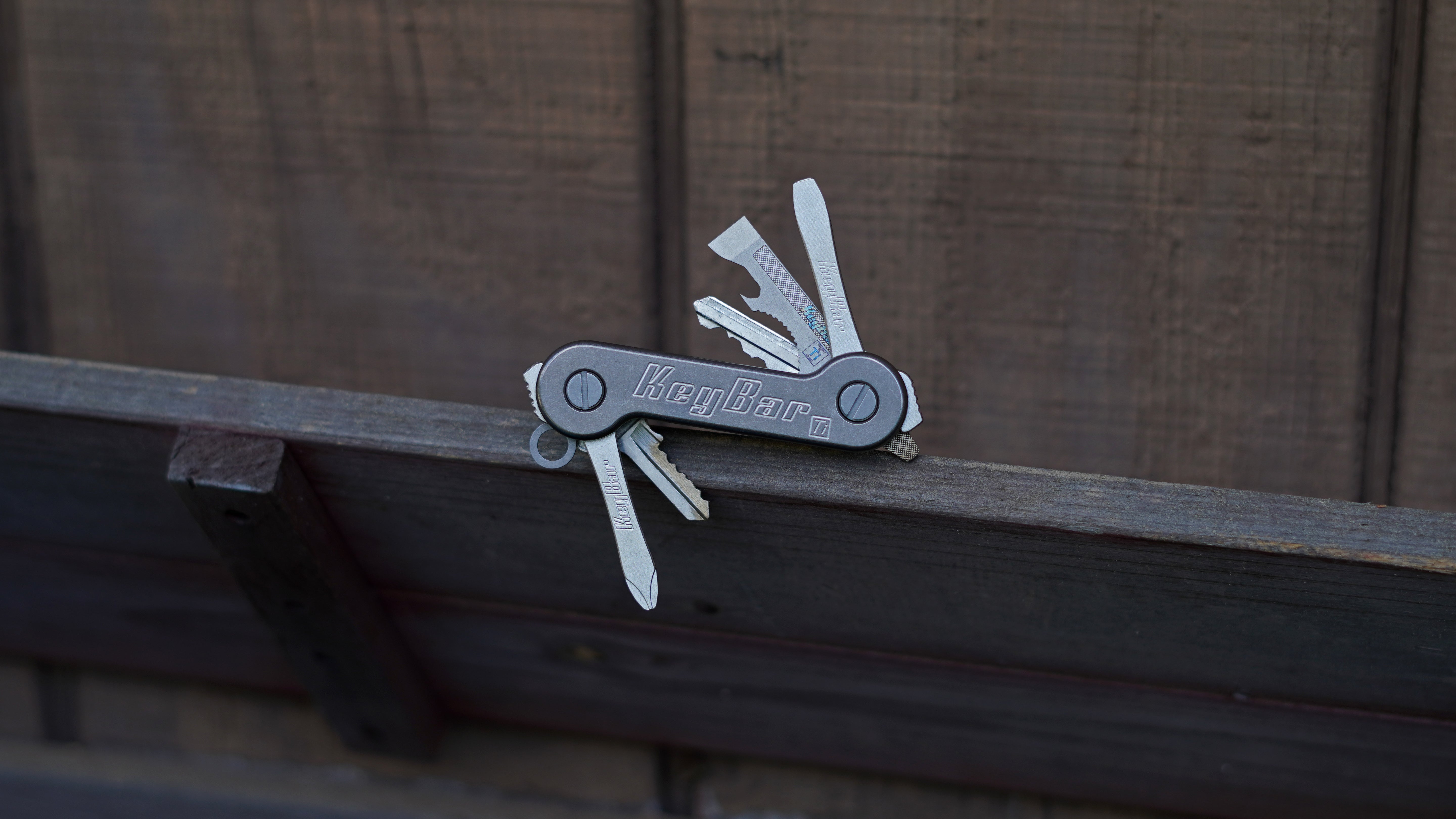 Titanium_KeyBar_Key_and_Tool_Organizer_on_wood
